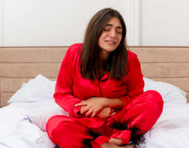 Doctor explaining uterine fibroids symptoms to patient