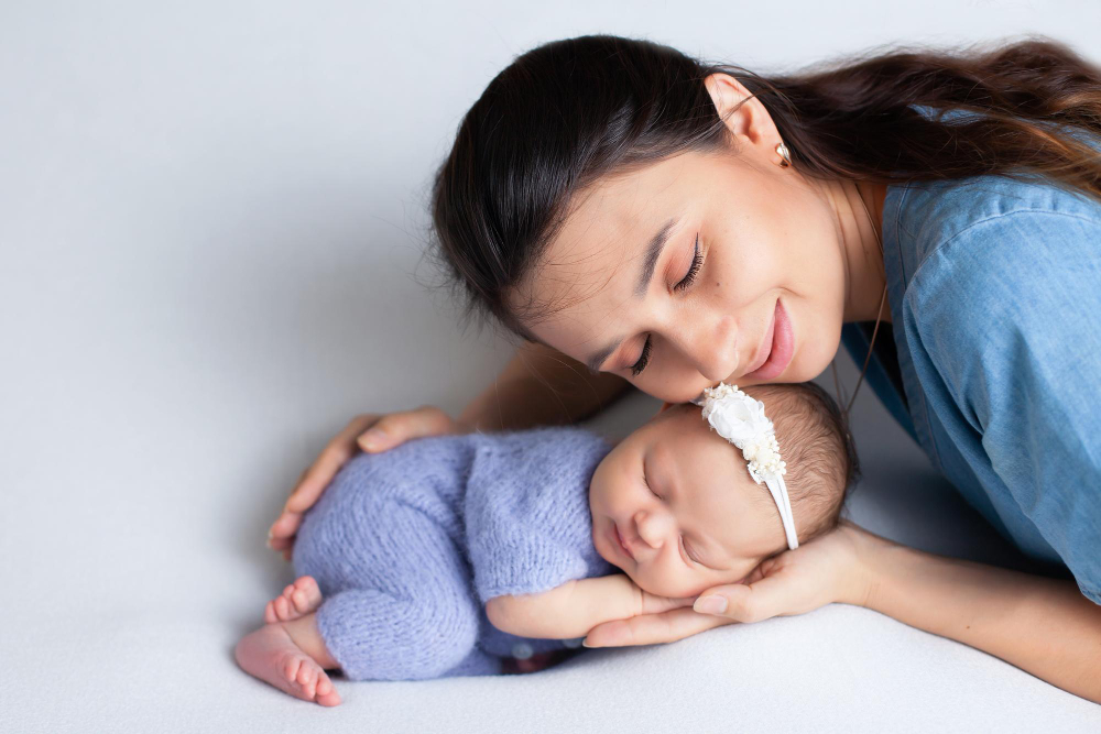 healthy newborn breastfeeding position with mother support